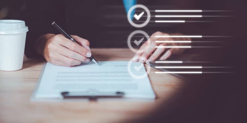 Business checklist on clipboard representing organized transaction processes
